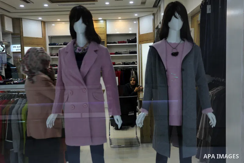 Palestinians shop in a new indoor shopping mall in the Gaza Strip, on February 23, 2017. In a welcome sign of normalcy, the first-of-its-kind indoor shopping mall -- complete with an international retail chain, three-sto...