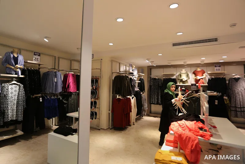 Palestinians shop in a new indoor shopping mall in the Gaza Strip, on February 23, 2017. In a welcome sign of normalcy, the first-of-its-kind indoor shopping mall -- complete with an international retail chain, three-sto...