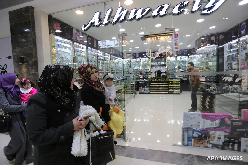 Palestinians shop in a new indoor shopping mall in the Gaza Strip, on February 23, 2017. In a welcome sign of normalcy, the first-of-its-kind indoor shopping mall -- complete with an international retail chain, three-sto...
