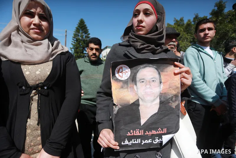 Palestinian supporters of the Popular Front for the Liberation of Palestine (PFLP), take part during a protest marking the first Anniversary of death of Palestinian Omar El-Nayef who was assassinated in Palestinian embas...