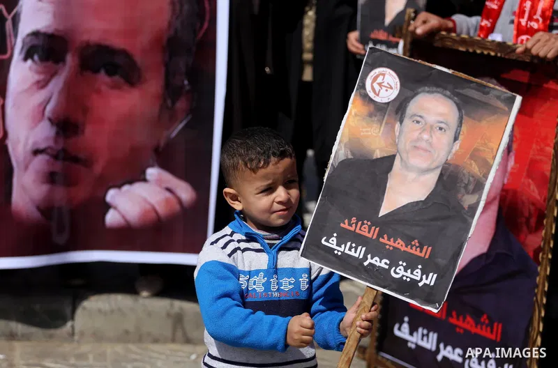 Palestinian supporters of the Popular Front for the Liberation of Palestine (PFLP), take part during a protest marking the first Anniversary of death of Palestinian Omar El-Nayef who was assassinated in Palestinian embas...