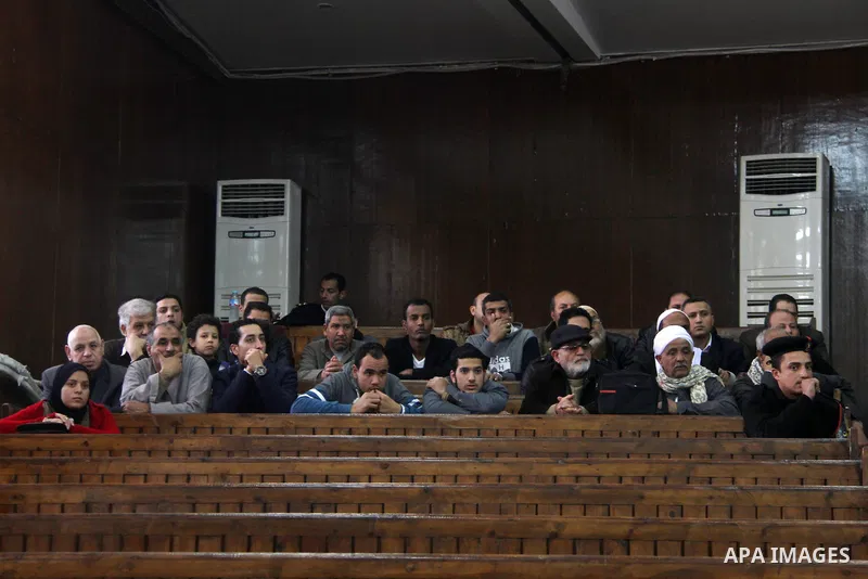 Relative of Egyptian Muslim Brotherhood defendants attend their trial, in a case known in media as "Rabaa Operations Room", in Cairo, on February 25, 2017. Photo by Amr Sayed