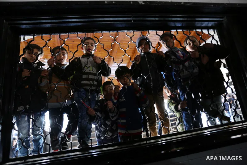 Palestinians mourn during the funeral of Obeid Soufi, 25, who died after inhaling toxic gas inside the tunnel along the border between the Gaza Strip and Egypt in Rafah in the southern Gaza strip, on February 25, 2017. T...
