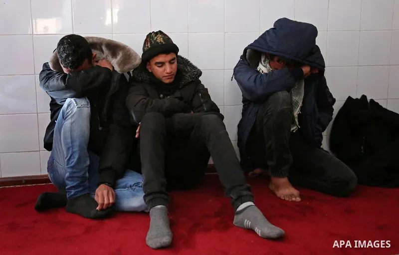 Palestinians mourn during the funeral of Obeid Soufi, 25, who died after inhaling toxic gas inside the tunnel along the border between the Gaza Strip and Egypt in Rafah in the southern Gaza strip, on February 25, 2017. T...