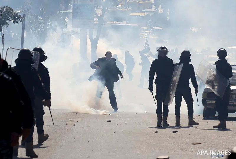 Members of the Palestinian security forces clash with demonstrators during a protest organised by Hizb-ut Tahrir against what organisers say are political arrests by the Palestinian Authority in the West Bank city of Heb...