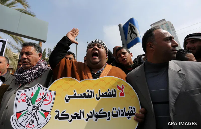 Palestinian supporters Fatah movement take part during a protest against the administrative detention, in Gaza city, on February 26, 2017. Photo by Ashraf Amra