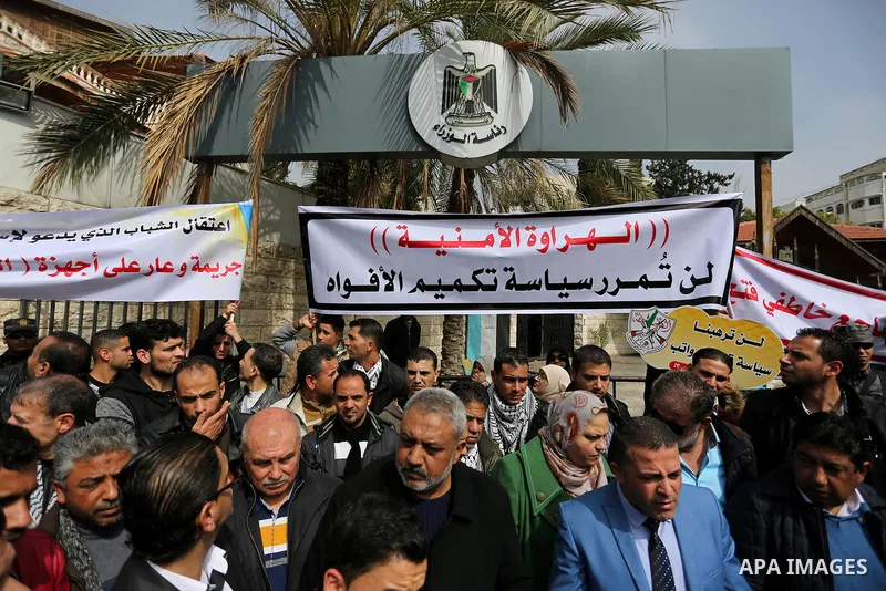 Palestinian supporters Fatah movement take part during a protest against the administrative detention, in Gaza city, on February 26, 2017. Photo by Ashraf Amra