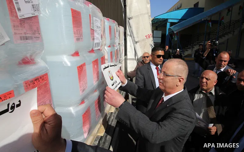 Palestinian Prime Minister Rami Hamdallah attends the launch of a convoy of medicines to Gaza strip, in the West bank city of Nablus on February 26, 2017. Photo by Prime Minister Office