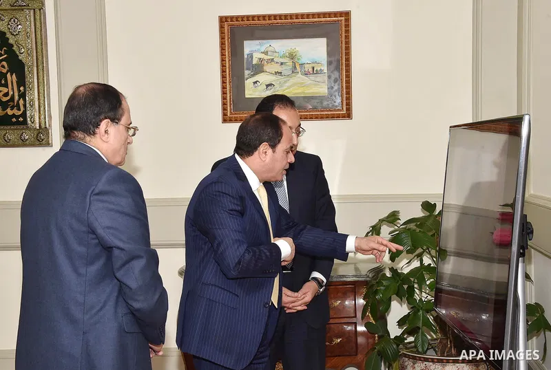 Egyptian President Abdel Fattah al-Sisi meets with Mustafa Madbouli, Housing Minister in Cairo, Egypt on February 27, 2017. Photo by Egyptian President Office