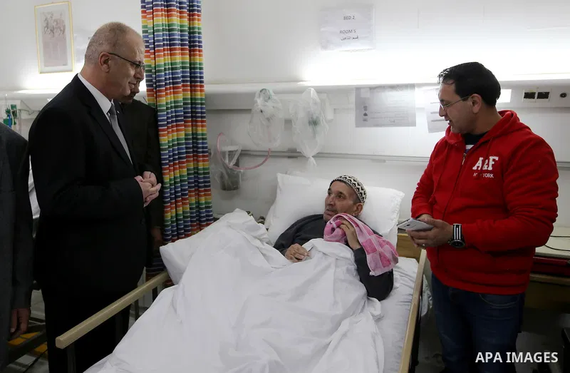 Palestinian Prime Minister Rami Hamdallah visits the Arab hospital of Beit Jala society for Rehabilitation, in the West Bank city of Beit Jala on February 28, 2017. Photo by Prime Minister Office