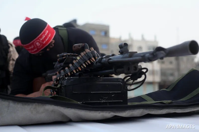 Palestinian militants of the Democratic Front for the Liberation of Palestine (DFLP) take part in a military show in Rafah in the southern Gaza Strip February 28, 2017. Photo by Ashraf Amra
