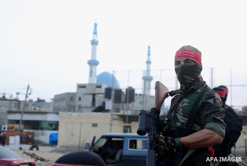 Palestinian militants of the Democratic Front for the Liberation of Palestine (DFLP) take part in a military show in Rafah in the southern Gaza Strip February 28, 2017. Photo by Ashraf Amra