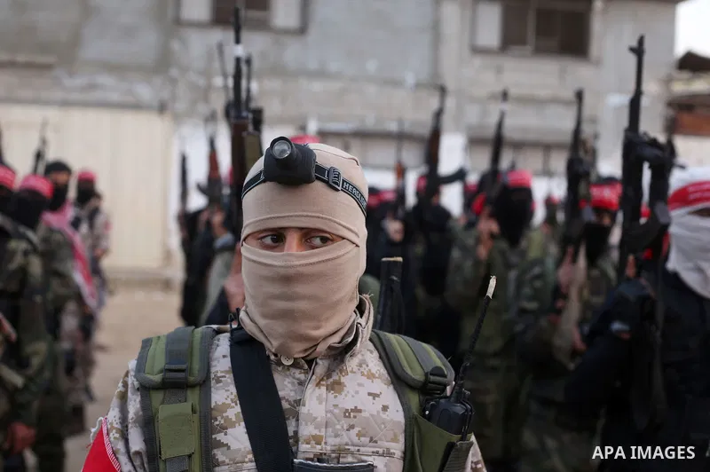 Palestinian militants of the Democratic Front for the Liberation of Palestine (DFLP) take part in a military show in Rafah in the southern Gaza Strip February 28, 2017. Photo by Ashraf Amra