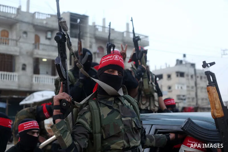 Palestinian militants of the Democratic Front for the Liberation of Palestine (DFLP) take part in a military show in Rafah in the southern Gaza Strip February 28, 2017. Photo by Ashraf Amra