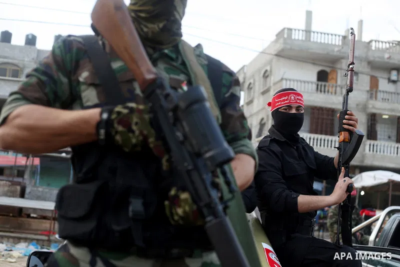 Palestinian militants of the Democratic Front for the Liberation of Palestine (DFLP) take part in a military show in Rafah in the southern Gaza Strip February 28, 2017. Photo by Ashraf Amra