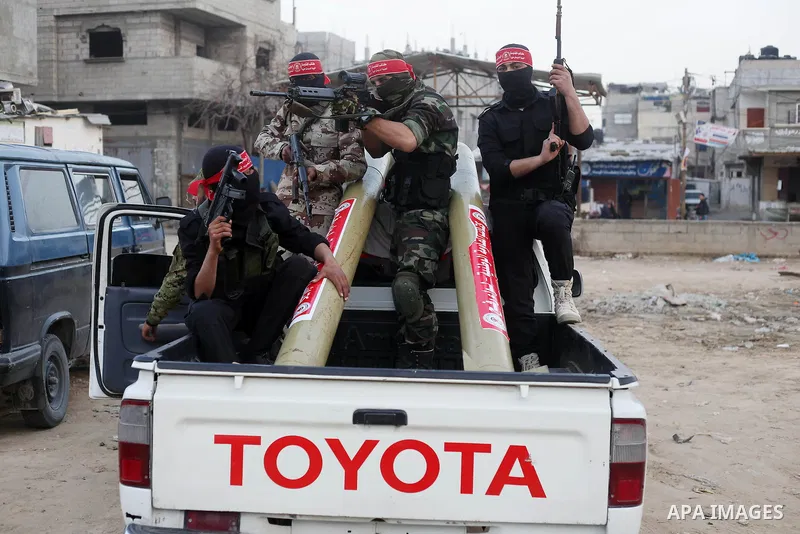 Palestinian militants of the Democratic Front for the Liberation of Palestine (DFLP) take part in a military show in Rafah in the southern Gaza Strip February 28, 2017. Photo by Ashraf Amra