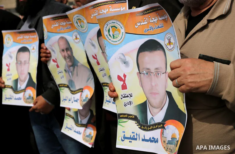 Palestinians take part during a protest to show solidarity with Palestinian prisoners on hunger strike in Israeli Jails, in Gaza city, on March 01, 2017. Photo by Ashraf Amra
