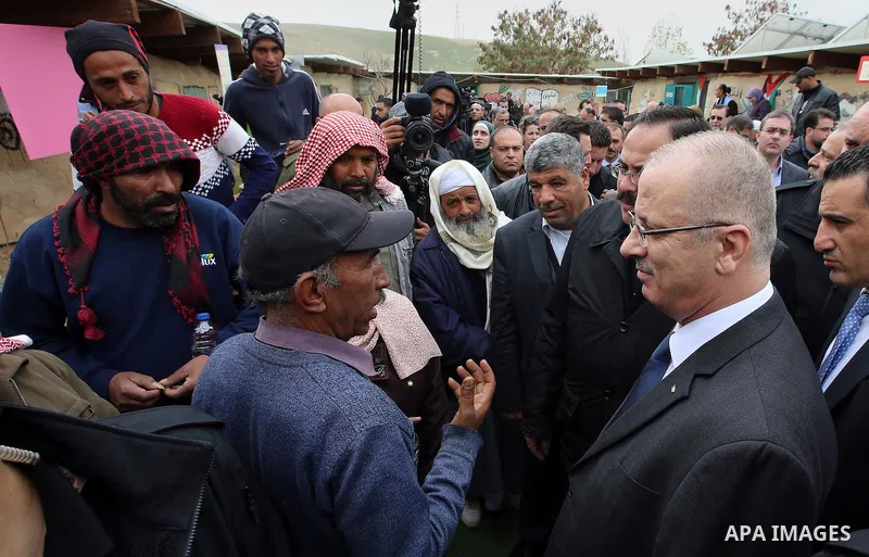 Palestinian Prime Minister, Rami Hamdallah, visits the combine Khan al-ahmar, in the East of Jerusalem, on March 2, 2017. Photo by Prime Minister Office