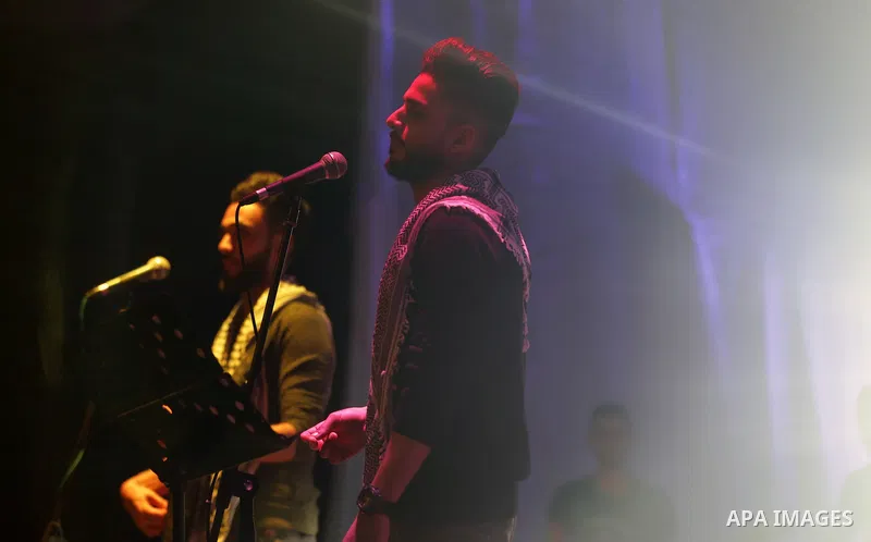 Gaza-based Palestinian band "Dawaween" perform in Gaza City on March 1, 2017. The organisers said the proceeds of the concert will go to support cancer patients. Photo by Yasser Qudih
