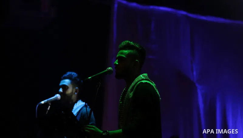 Gaza-based Palestinian band "Dawaween" perform in Gaza City on March 1, 2017. The organisers said the proceeds of the concert will go to support cancer patients. Photo by Yasser Qudih