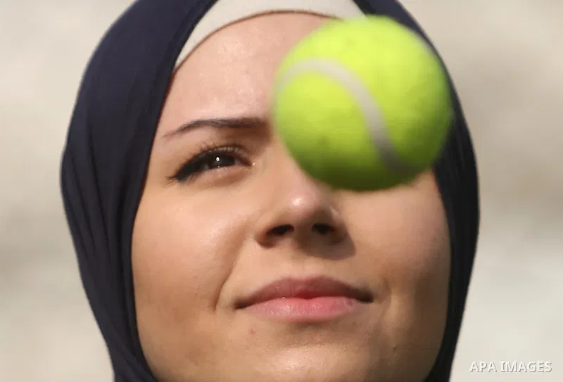 A Palestinian girl takes part in Baseball training, in Gaza city, on February 20, 2017. Baseball is a bat-and-ball game played between two teams of nine players each, who take turns batting and fielding. Baseball is thou...