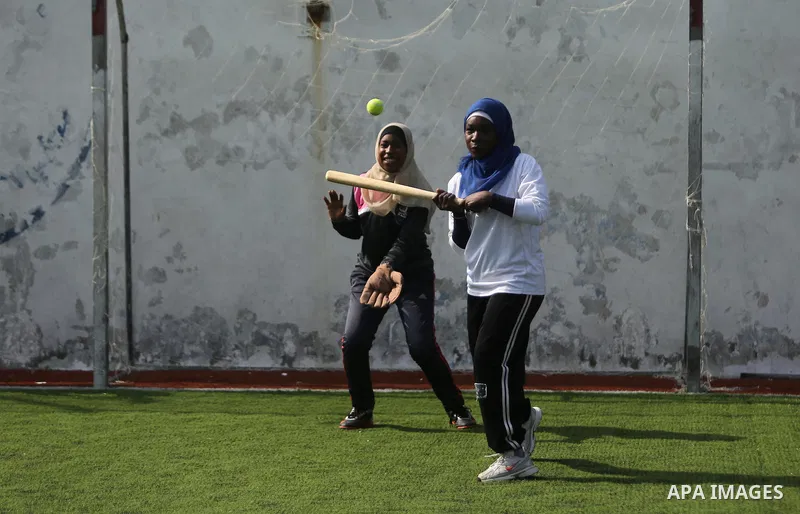 Palestinian girls take part in Baseball training, in Gaza city, on February 20, 2017. Baseball is a bat-and-ball game played between two teams of nine players each, who take turns batting and fielding. Baseball is though...