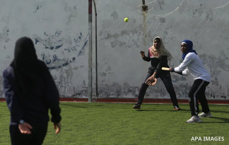 Palestinian girls take part in Baseball training, in Gaza city, on February 20, 2017. Baseball is a bat-and-ball game played between two teams of nine players each, who take turns batting and fielding. Baseball is though...