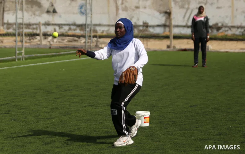 Palestinian girls take part in Baseball training, in Gaza city, on February 20, 2017. Baseball is a bat-and-ball game played between two teams of nine players each, who take turns batting and fielding. Baseball is though...