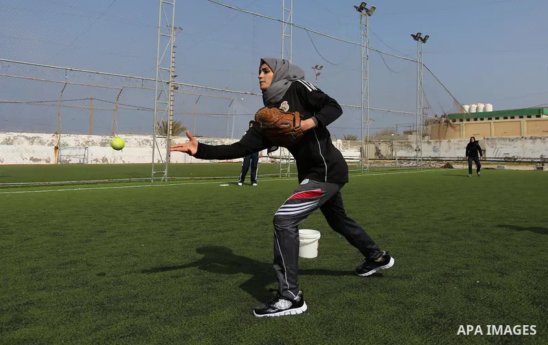 Palestinian girls take part in Baseball training, in Gaza city, on February 20, 2017. Baseball is a bat-and-ball game played between two teams of nine players each, who take turns batting and fielding. Baseball is though...