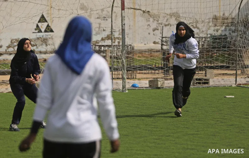 Palestinian girls take part in Baseball training, in Gaza city, on February 20, 2017. Baseball is a bat-and-ball game played between two teams of nine players each, who take turns batting and fielding. Baseball is though...