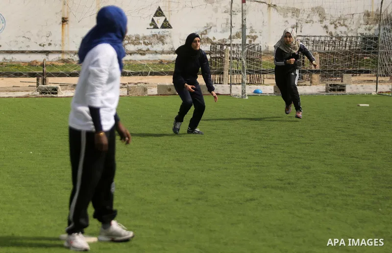 Palestinian girls take part in Baseball training, in Gaza city, on February 20, 2017. Baseball is a bat-and-ball game played between two teams of nine players each, who take turns batting and fielding. Baseball is though...
