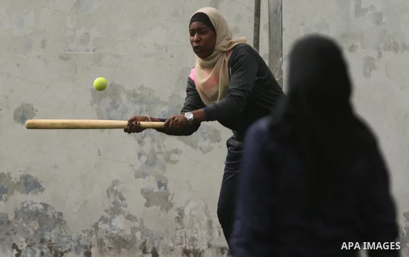 Palestinian girls take part in Baseball training, in Gaza city, on February 20, 2017. Baseball is a bat-and-ball game played between two teams of nine players each, who take turns batting and fielding. Baseball is though...