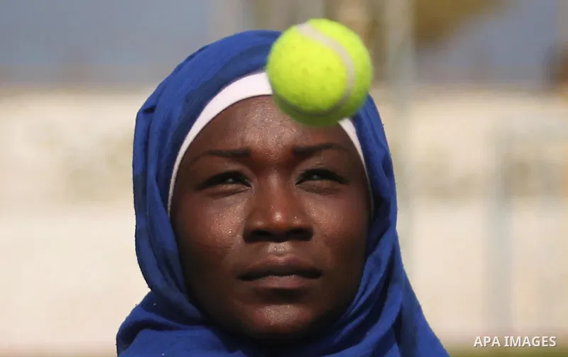 A Palestinian girl takes part in Baseball training, in Gaza city, on February 20, 2017. Baseball is a bat-and-ball game played between two teams of nine players each, who take turns batting and fielding. Baseball is thou...
