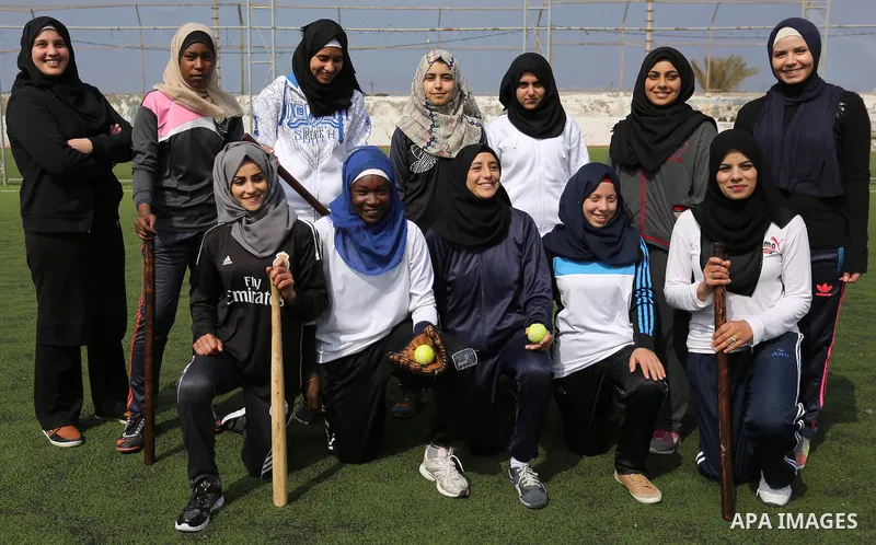 Palestinian girls take part in Baseball training, in Gaza city, on February 20, 2017. Baseball is a bat-and-ball game played between two teams of nine players each, who take turns batting and fielding. Baseball is though...