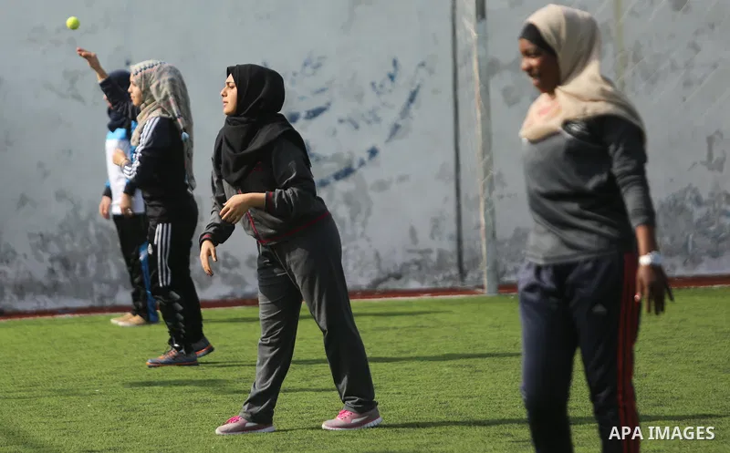 Palestinian girls take part in Baseball training, in Gaza city, on February 20, 2017. Baseball is a bat-and-ball game played between two teams of nine players each, who take turns batting and fielding. Baseball is though...