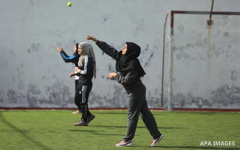 Palestinian girls take part in Baseball training, in Gaza city, on February 20, 2017. Baseball is a bat-and-ball game played between two teams of nine players each, who take turns batting and fielding. Baseball is though...