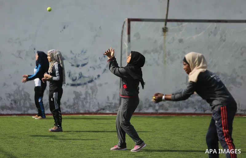 Palestinian girls take part in Baseball training, in Gaza city, on February 20, 2017. Baseball is a bat-and-ball game played between two teams of nine players each, who take turns batting and fielding. Baseball is though...