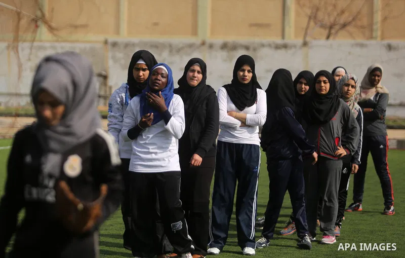 Palestinian girls take part in Baseball training, in Gaza city, on February 20, 2017. Baseball is a bat-and-ball game played between two teams of nine players each, who take turns batting and fielding. Baseball is though...