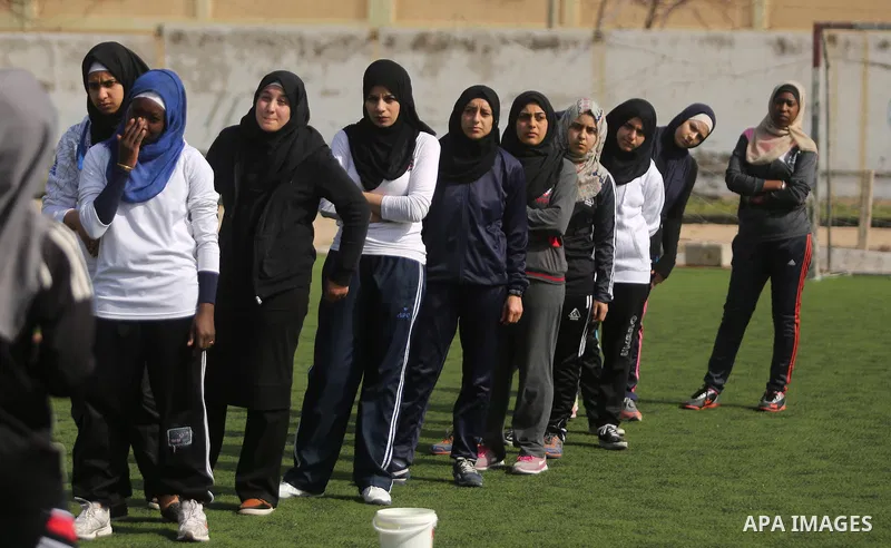 Palestinian girls take part in Baseball training, in Gaza city, on February 20, 2017. Baseball is a bat-and-ball game played between two teams of nine players each, who take turns batting and fielding. Baseball is though...