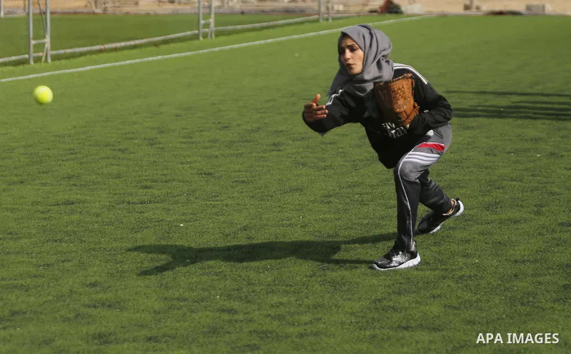 Palestinian girls take part in Baseball training, in Gaza city, on February 20, 2017. Baseball is a bat-and-ball game played between two teams of nine players each, who take turns batting and fielding. Baseball is though...