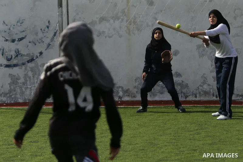 Palestinian girls take part in Baseball training, in Gaza city, on February 20, 2017. Baseball is a bat-and-ball game played between two teams of nine players each, who take turns batting and fielding. Baseball is though...
