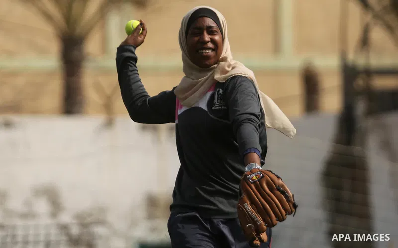 A Palestinian girl takes part in Baseball training, in Gaza city, on February 20, 2017. Baseball is a bat-and-ball game played between two teams of nine players each, who take turns batting and fielding. Baseball is thou...
