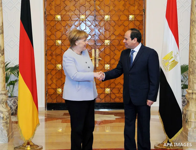 Egyptian President Abdel Fattah al-Sisi shakes hands with German Chancellor Angela Merkel at the El-Thadiya presidential palace in Cairo, Egypt March 2, 2017. Photo by Egyptian President Office