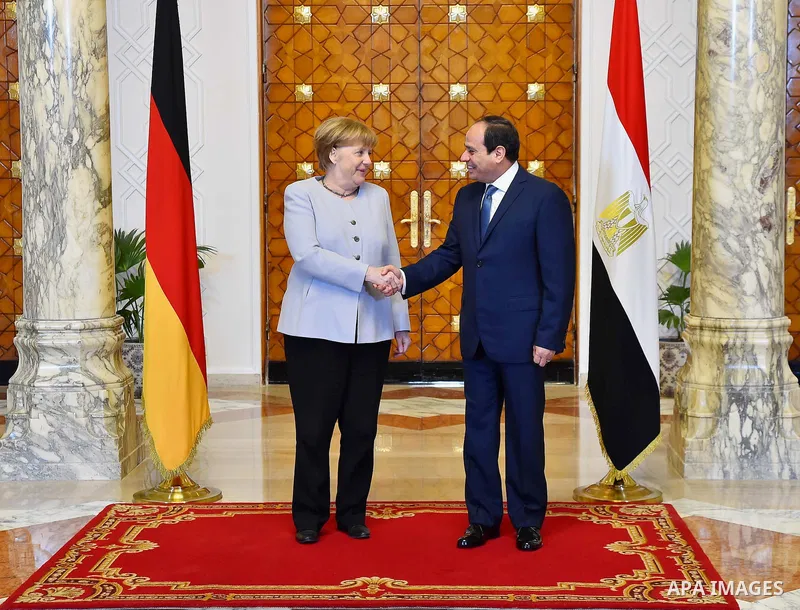 Egyptian President Abdel Fattah al-Sisi shakes hands with German Chancellor Angela Merkel at the El-Thadiya presidential palace in Cairo, Egypt March 2, 2017. Photo by Egyptian President Office