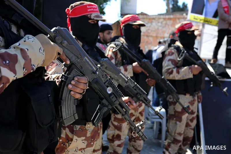 Palestinian militants of the Democratic Front for the Liberation of Palestine (DFLP) take part in a rally marking the 48th anniversary of DFLP foundation in Gaza city on March 04, 2017. Photo by Ashraf Amra