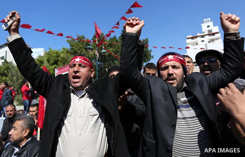 Palestinian supporters of the Democratic Front for the Liberation of Palestine (DFLP) take part in a rally marking the 48th anniversary of DFLP foundation in Gaza city on March 04, 2017. Photo by Ashraf Amra