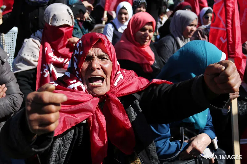 Palestinian supporters of the Democratic Front for the Liberation of Palestine (DFLP) take part in a rally marking the 48th anniversary of DFLP foundation in Gaza city on March 04, 2017. Photo by Ashraf Amra