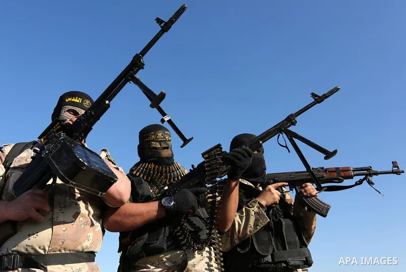 Palestinian militants from the Al-Quds Brigades, the armed wing of the Islamic Jihad movement, take part in a military parade, in Khan younis in the southern Gaza strip, on March 4, 2017. Photo by Ashraf Amra