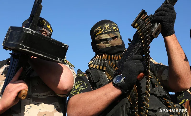 Palestinian militants from the Al-Quds Brigades, the armed wing of the Islamic Jihad movement, take part in a military parade, in Khan younis in the southern Gaza strip, on March 4, 2017. Photo by Ashraf Amra