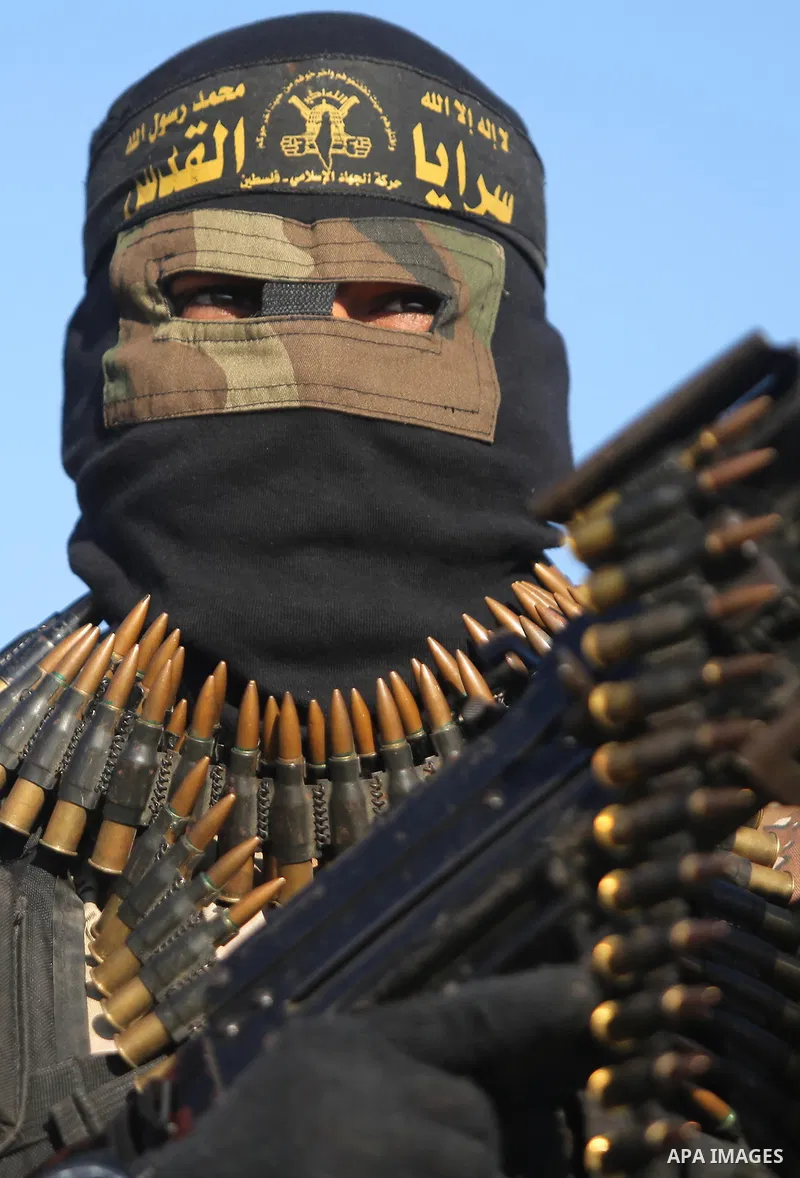 Palestinian militants from the Al-Quds Brigades, the armed wing of the Islamic Jihad movement, take part in a military parade, in Khan younis in the southern Gaza strip, on March 4, 2017. Photo by Ashraf Amra